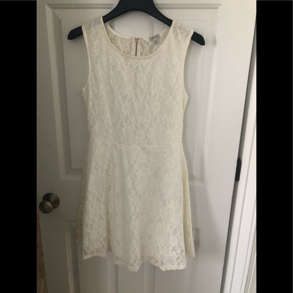 Women’s size S lace dress w/lining cream colored